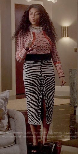 Cookie’s orange printed sweater and zebra stripe skirt on Empire