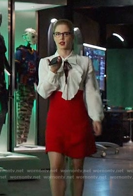 Felicity’s white ruffled blouse and red skirt on Arrow