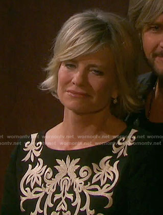 Kayla’s black dress with white embroidery on Days of our Lives