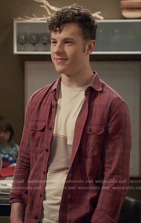 Luke’s red plaid shirt on Modern Family