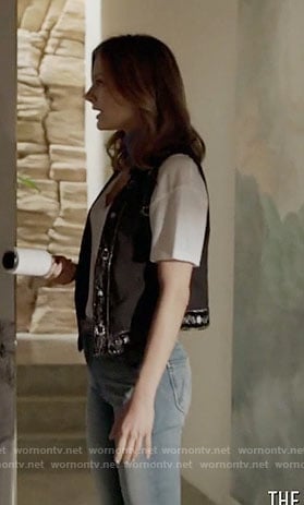 Megan’s black embroidered vest on The Arrangement