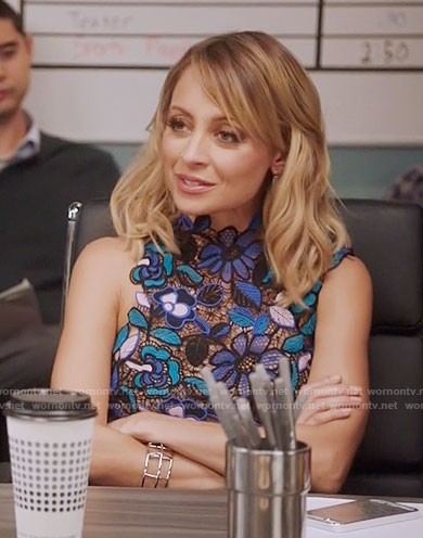 Portia’s blue and green lace top on Great News