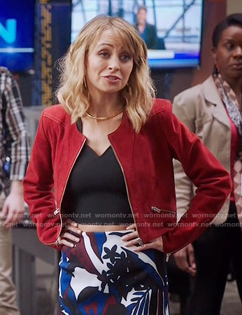 Portia’s red suede jacket and floral pencil skirt on Great News