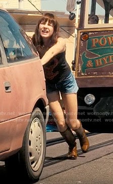Sophia’s tan boots on Girlboss