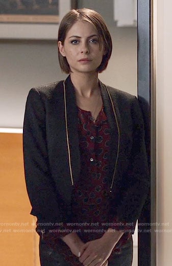 Thea’s red dotted print top and black zip detail jacket on Arrow