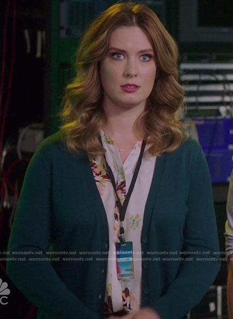 Katie’s cream floral blouse on Great News