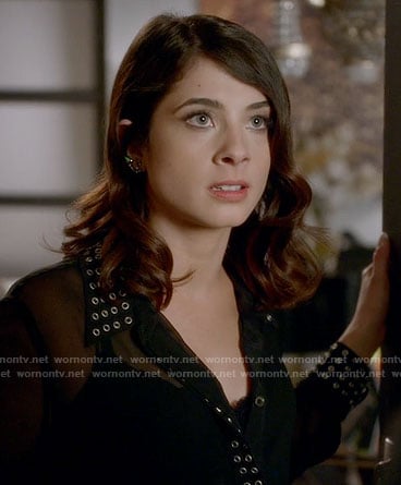Alexis’s black grommet trim shirt on Famous in Love