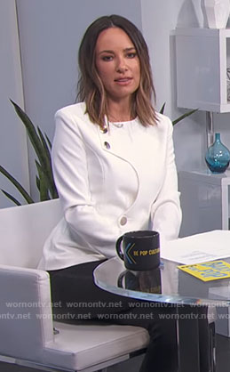 Catt’s white jacket on E! News Daily Pop