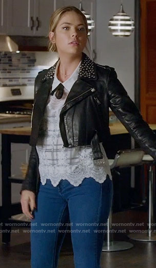 Hanna’s white plaid lace top and cropped leather jacket with studded collar on Pretty Little Liars