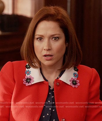Kimmy’s red coat with floral collar on Unbreakable Kimmy Schmidt