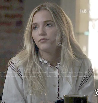 Maddie’s white embroidered scallop trim top on Nashville