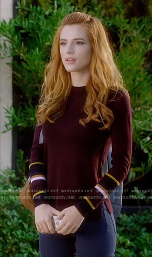 Paige’s burgundy sweater with striped cuffs on Famous in Love