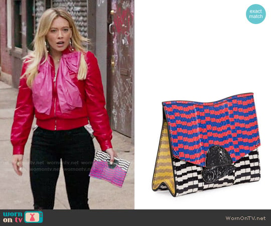 Proenza Schouler Small Mixed-Print Snakeskin Clutch Bag worn by Kelsey Peters (Hilary Duff) on Younger