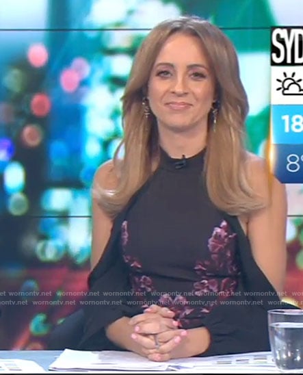 Carrie’s black floral cold-shoulder dress on The Project