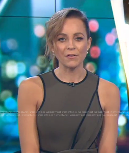 Carrie’s green twisted front dress on The Project