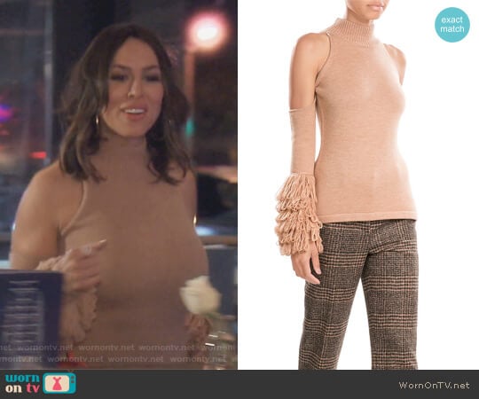 Jonathan Simkhai Merino Wool Pullover with Cut-Out Shoulders worn by Kelly Dodd on The Real Housewives of Orange County