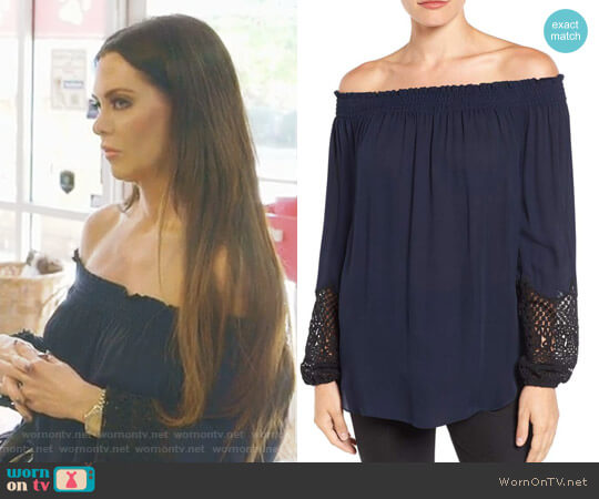 Kobi Halperin Karalee Lace Cuff Silk Off the Shoulder Blouse worn by D’Andra Simmons on The Real Housewives of Dallas