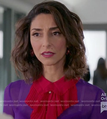 Delia’s purple blouse with red ruffle front on Girlfriends Guide to Divorce