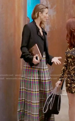 Phoebe’s plaid wide-leg trousers on Girlfriends Guide to Divorce