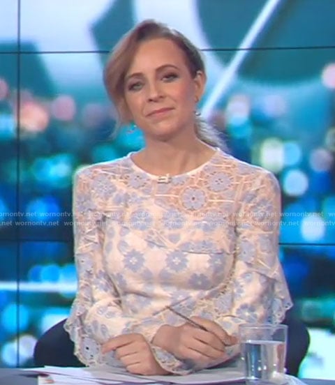 Carrie’s white floral ruffle trimmed lace dress on The Project