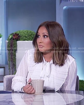 Adrienne’s white ruffled top on The Real