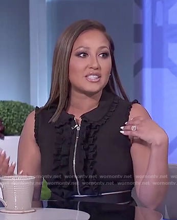 Adrienne’s black ruffled zip dress on The Real