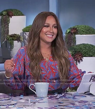 Adrienne’s blue printed wrap blouse on The Real