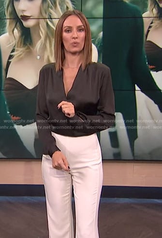Catt’s black crossed front top and white slit pants on E! News