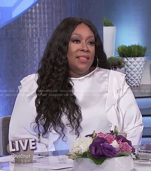Loni’s white ruffle top on The Real