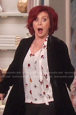 Sharon’s silk print neck tie top on The Talk