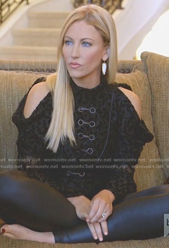 Stephanie’s black cold-shoulder velvet top on The Real Housewives of Dallas
