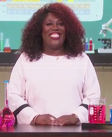 Sheryl’s pink ribbon sleeve top on The Talk