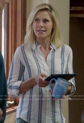 Claire’s blue striped button front shirt on Modern Family