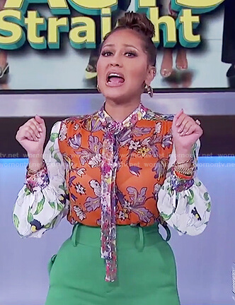 Adrienne’s orange floral print long sleeved silk top on The Real