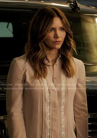 Paige’s pink shirt with lace insets on Scorpion
