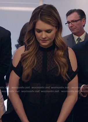 Sutton’s black dotted cold-shoulder shirt on The Bold Type