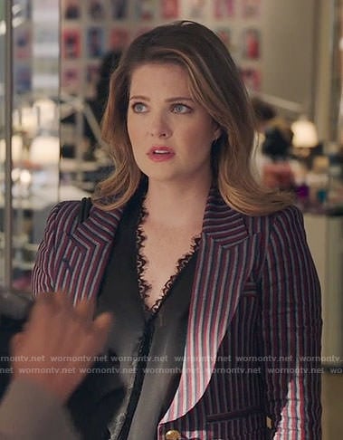 Sutton’s striped blazer and black lace trim top on The Bold Type