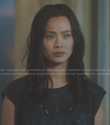 Clarice’s black unrivalled cat graphic top on The Gifted