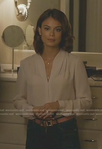 Cristal’s white gathered v-neck blouse on Dynasty