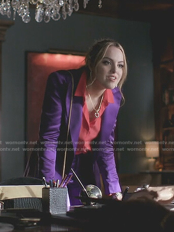 Fallon’s red ruffle cuff blouse and purple suit on Dynasty
