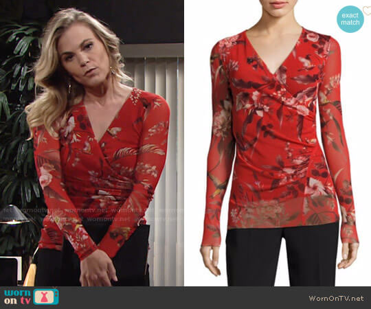 Fuzzi Humming Bird Print Surplice Top worn by Phyllis Newman (Gina Tognoni) on The Young and the Restless