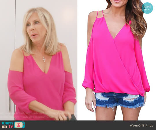 Imily Bela Long Cold Shoulder Wrap V Neck Top worn by Vicki Gunvalson on The Real Housewives of Orange County