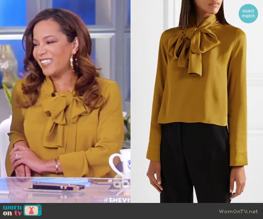 Khaite Dawn pussy-bow satin-crepe blouse worn by Sunny Hostin on The View