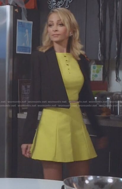 Portia’s yellow a-line dress with cutouts on Great News
