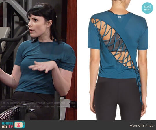 Alo Entwine Crop Tee in Legion Blue worn by Tessa Porter (Cait Fairbanks) on The Young and the Restless