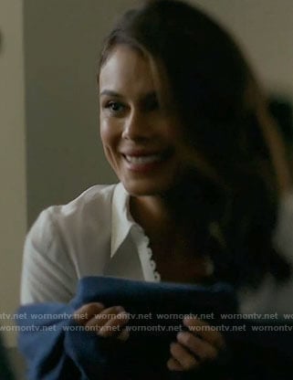 Cristal’s white buttoned blouse on Dynasty