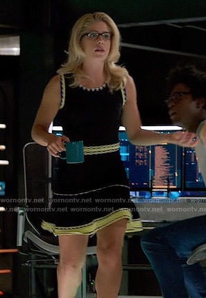 Felicity’s black dress with yellow stitched trim on Arrow