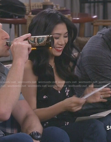 Eve’s black floral print cami on 9JKL