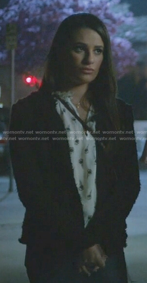 Valentina’s white tulip print sleeveless top on The Mayor