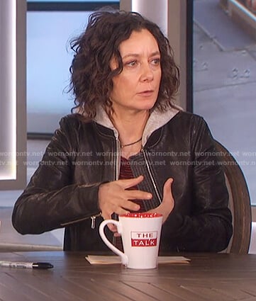 Sara’s black hooded leather jacket and striped shirt on The Talk